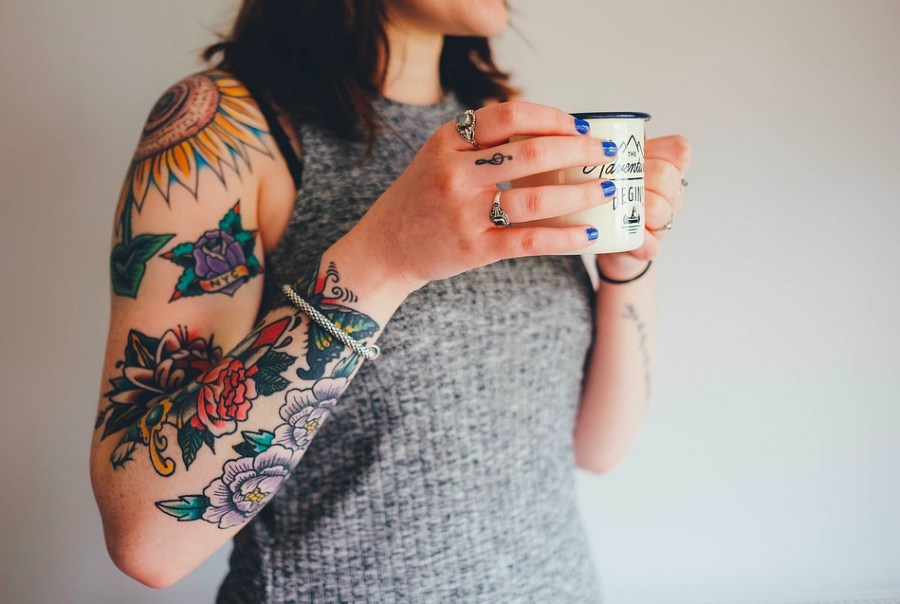 WOW. A woman has tattoos on her arm. Many people still have issues with the idea of minors having tattoos before they are the age of eighteen. “I think minors should be able to choose if they want a tattoo or not,” said Anusha Gambheera, 9. 