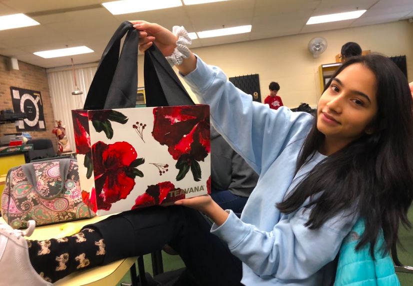HOLIDAY FUN. Secret Santa is among the top winter traditions at SHS. Classes, clubs, sports teams, friends, and family can all be found with their own version. Senior Teddy Weng is even participating in six different ones this month. 