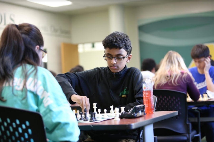 CONCENTRATE. Sophomore Arvind Prasad focuses on the board as time winds down. He is Board One and was his freshman year too, though team members are allowed to challenge each other to get a higher board number. “The seasons going pretty well. It’s crazy that this is my last year of chess because I’ve played it all four years of high school,” said Nandita Kulkarni, 12.