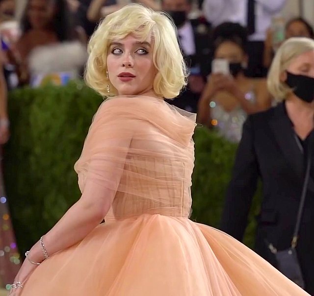 Singer+Billie+Eilish+was+one+of+the+many+notable+celebrities+at+the+Met+Gala%2C+stunning+crowds+in+her+voluminous+gown+and+iconic+look.