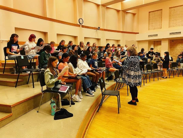 It’s showtime! The Cincinnati Youth Choir (CYC) is performing at the Bengals vs. Browns game on Dec. 11, at halftime. Pictured above is CYC rehearsing for this event.