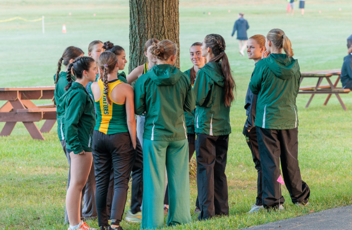 Cross country team huddle
