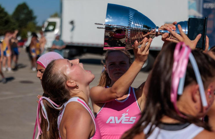 Charlotte Lang, 10, celebrates after a cross country race.
