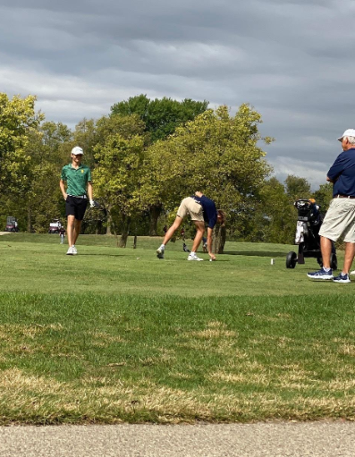 Michael Vesio, 10, participates in a golf tournament.  