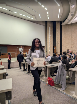 Ifedolapo Ogunbodede, 12, walks back to her seat after winning a Best Witness Award.