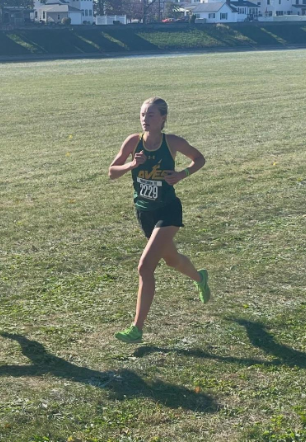 Corrine Schatz, 12, runs in a cross country race.