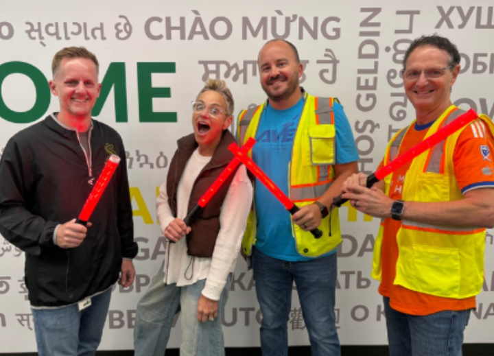 from left: Brian Sweeney, Ann Delehanty-Koenig, Eric Fangman, and David Swift take a picture together before going out to direct traffic.